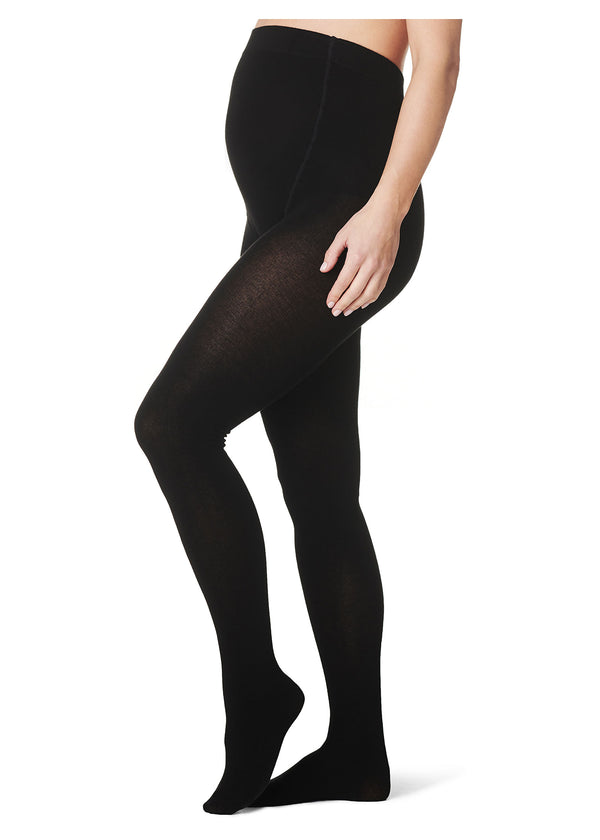 Schwangere Frau trägt schwarze Schwangerschafts-Strümpfe aus Baumwolle, seitlich/vorne