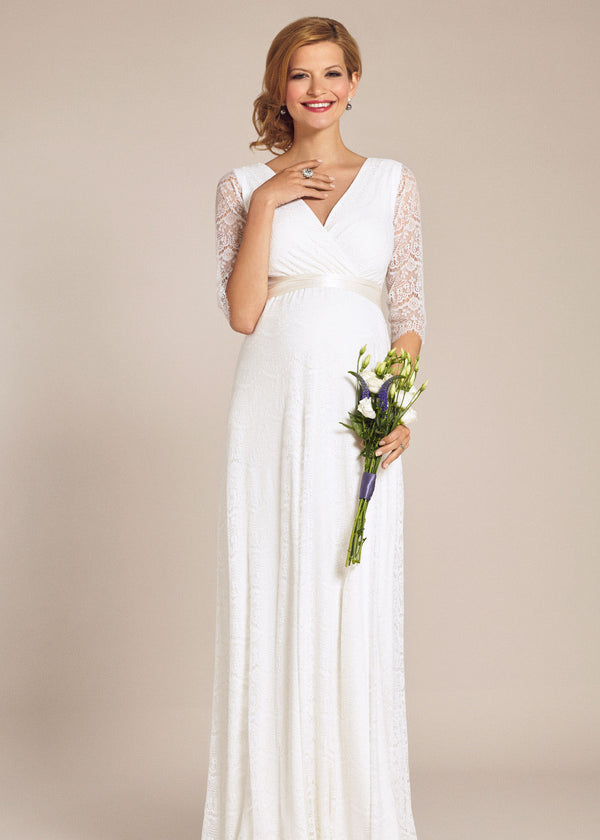 Bodenlanges Hochzeitskleid für Schwangere mit feiner Boho-Spitze und Ärmeln, welche bis zum Ellbogen reichen. Satinband, um die Taille zu betonen, ist separat erhältlich.